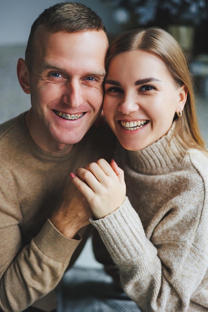 Portrait of a happy smiling couple hugs of people in love Emotions of joy and love