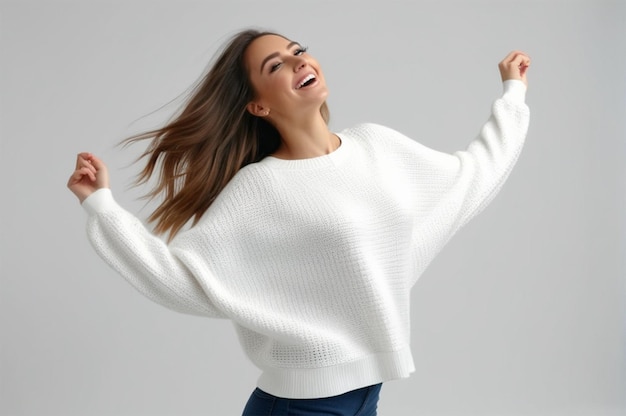 portrait of a happy woman in winter clothes white backdrop