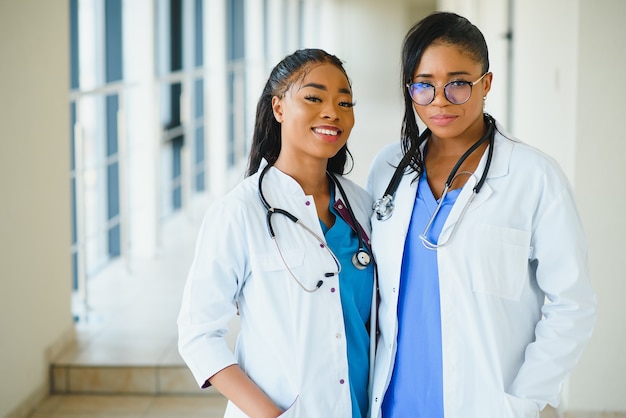 Portrait of happy young african american nurses