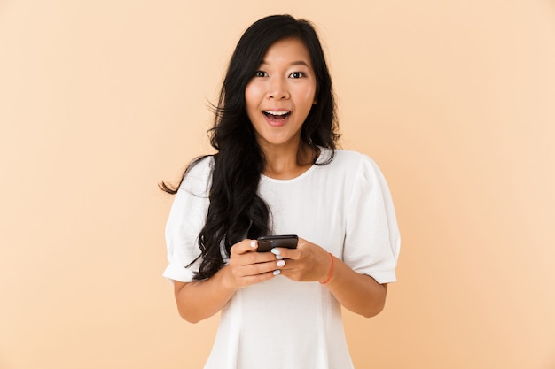 Portrait of a happy young asian woman