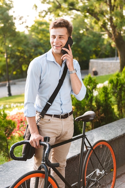 Portrait of a happy young man dressed in shirt