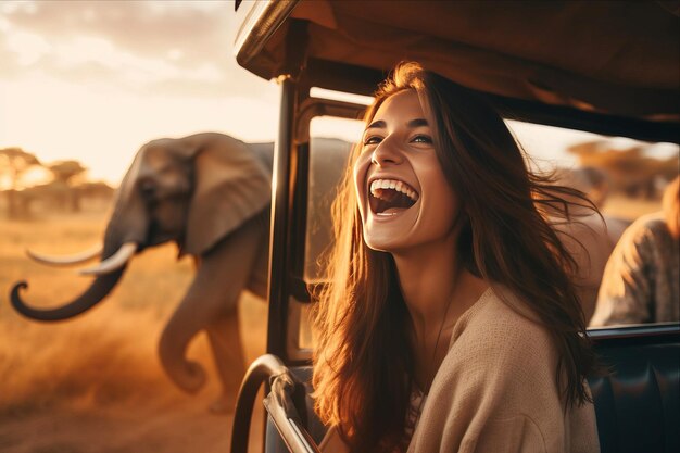 Photo portrait of a happy young woman smiling while sitting in a safari car at sunset