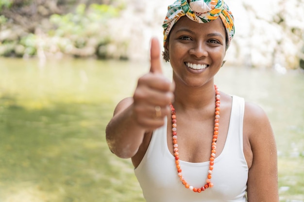 Portrait of a happy young woman wearing traditional Latin American clothing