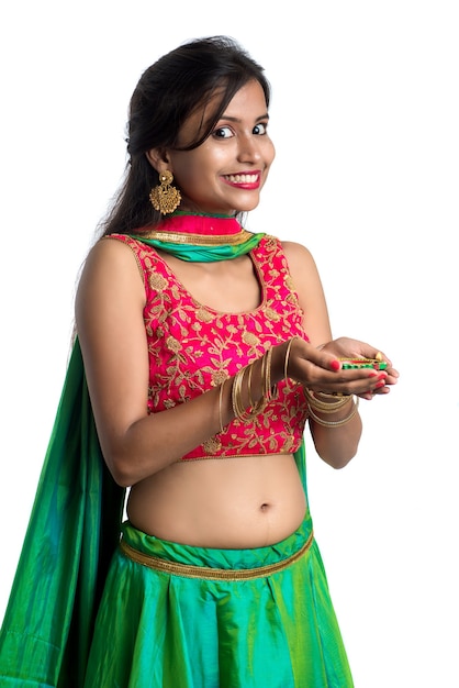 Portrait of a Indian Traditional Girl holding Diya