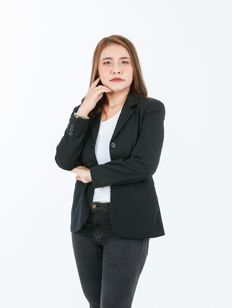 Portrait isolated cutout studio full body shot of Asian confident female professional successful businesswoman in formal black suit high heels standing post look at camera on white background