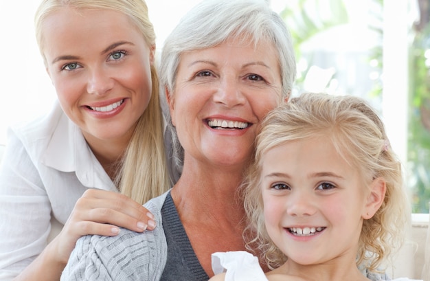 Portrait of a joyful family looking at the camera