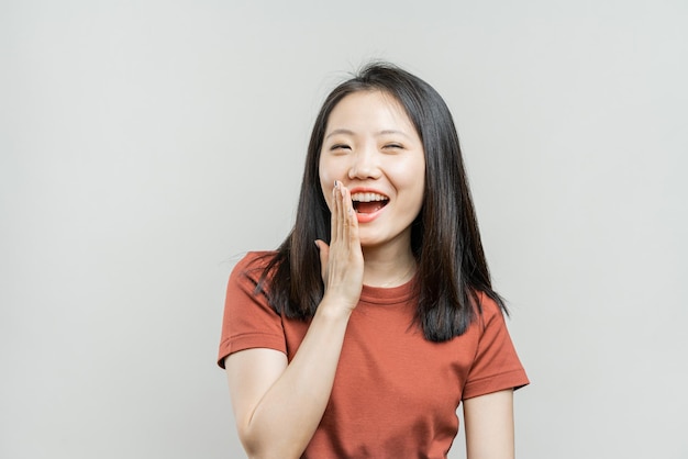 Portrait of a Korean girl on a gray background