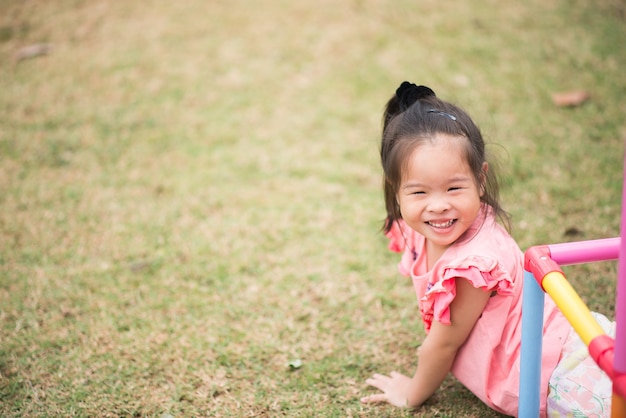 portrait little asian girl playing