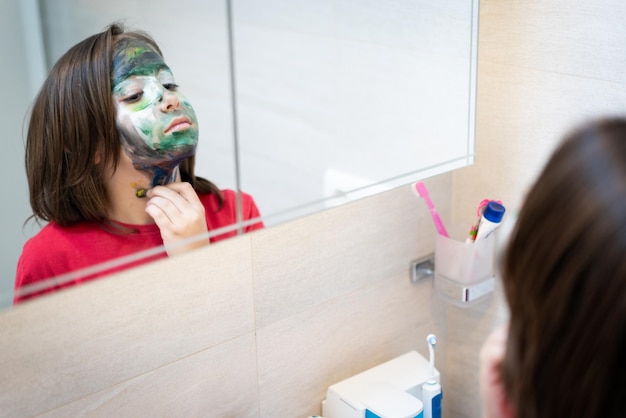 Portrait of little cute boy smiling with painted face high quality photo