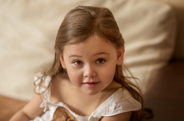 portrait of a little girl indoors