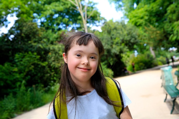 Portrait of little girl smiling in the park