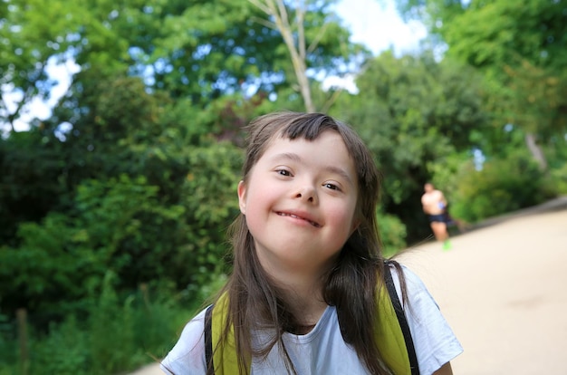 Portrait of little girl smiling in the park