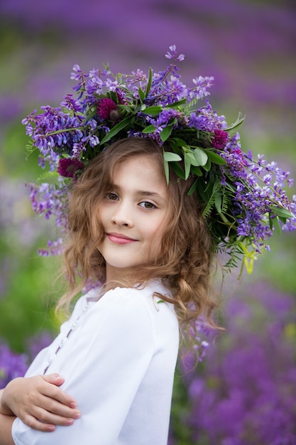 portrait of a little girl with a wreath on her head