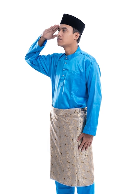 Photo portrait of malaysian male with salute gesture over white background