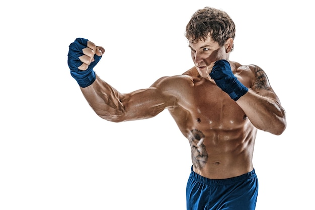 Portrait of male boxer who training and practicing right hook on white background Blue sportswear