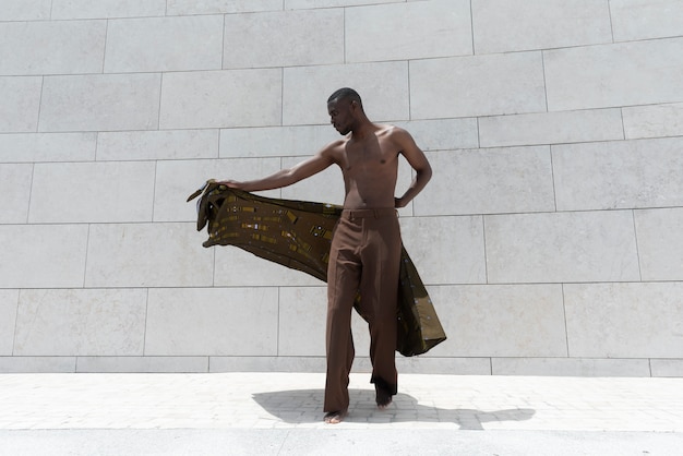 Portrait of man outdoors in traditional african attire