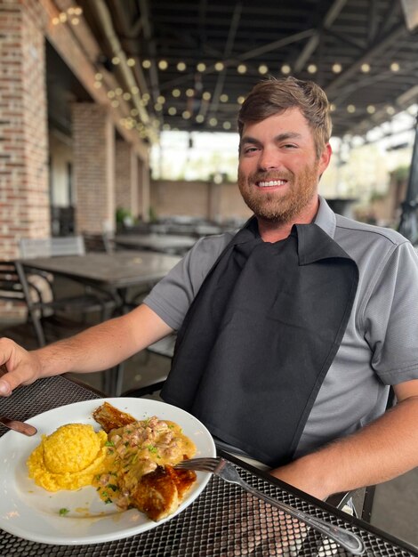 Portrait of man preparing food in restaurant