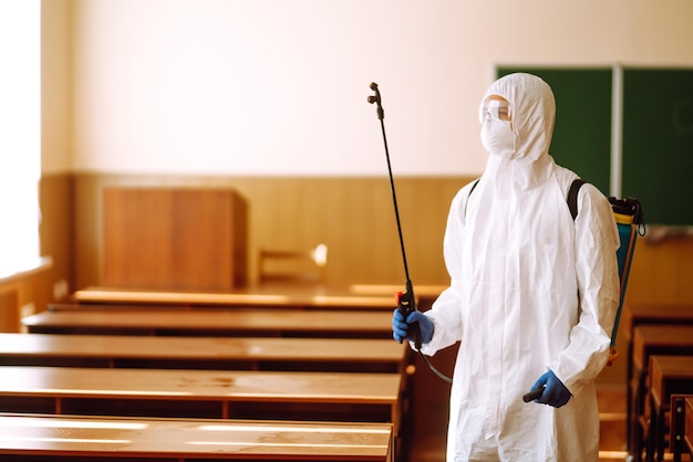 Portrait of man in protective hazmat suit