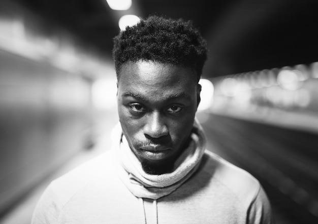 Portrait of a man at a subway platform