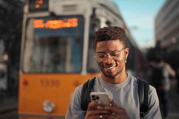 portrait of man while using a smartphone