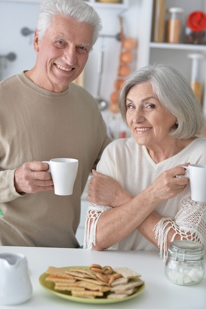 Portrait of a mature couple drinking tea