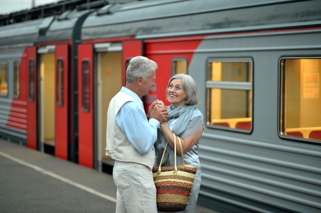 Portrait of  Mature   couple at the train station