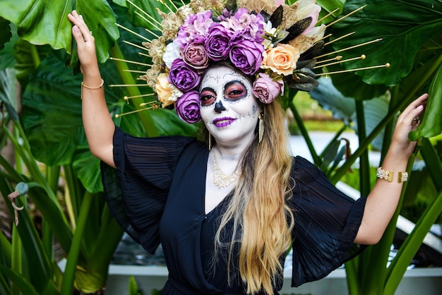 Portrait of Mexican woman made up as a catrina