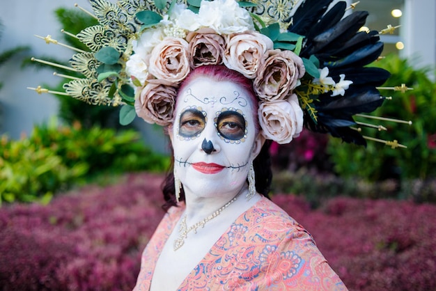 Portrait of Mexican woman made up as a catrina