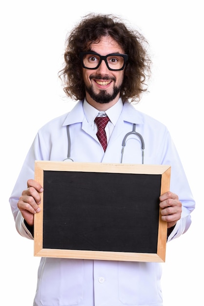 Photo portrait of mid adult man standing against white background