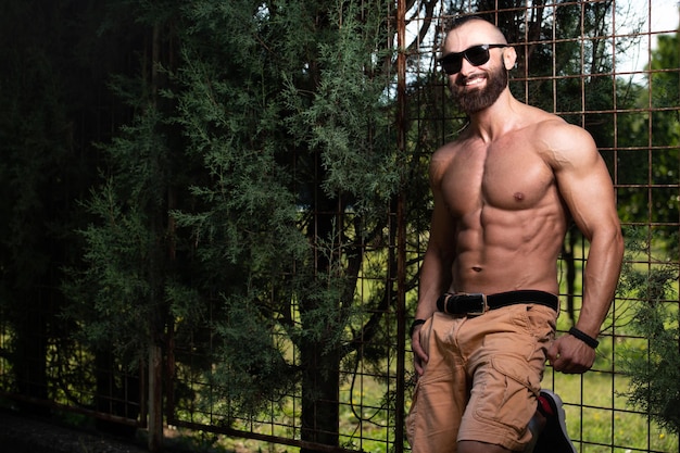 Portrait of a Model Man Standing Outdoors