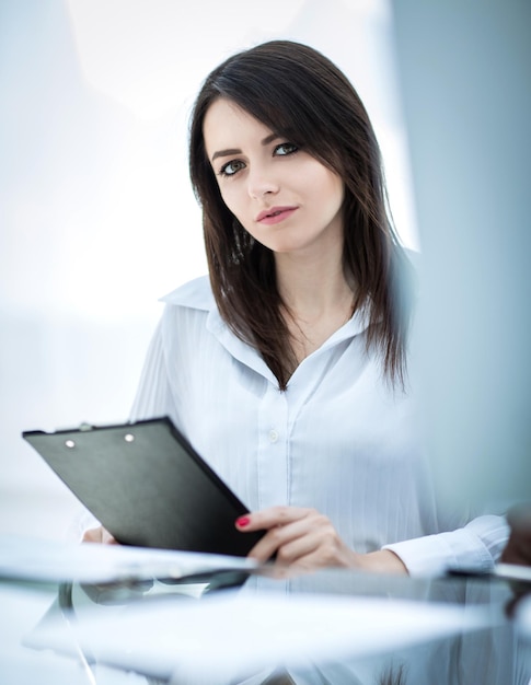 Portrait of modern business woman with documents