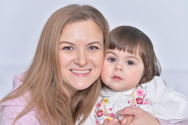 Portrait of mother and daughter having fun