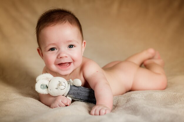 Portrait of newborn baby is lying on the blanket