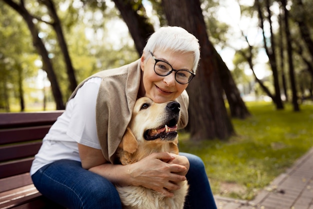 Portrait of older person with their dog