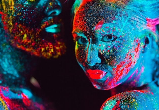 Portrait of a pair of lovers painted in fluorescent powder