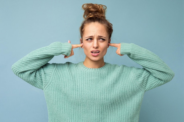 Portrait photo of young nice attractive pretty blond woman with sincere emotions wearing trendy blue