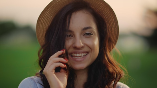 Portrait of playful lady smiling outdoors Young woman looking camera