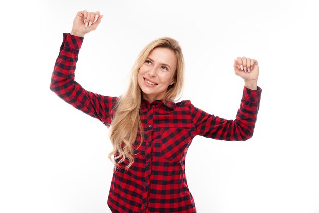 Portrait positive blonde girl emotionally rejoices and feels happy satisfied isolated on white background advertising banner