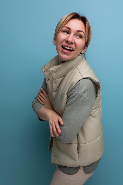 Portrait of a pretty european year old woman in comfortable clothes smiling friendly