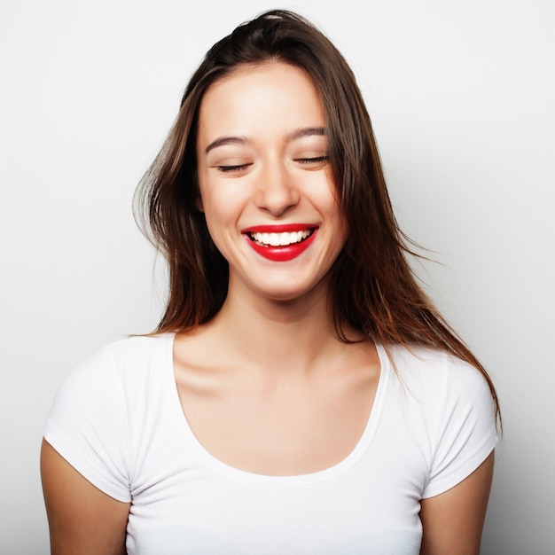 Portrait of a pretty girl on a white background