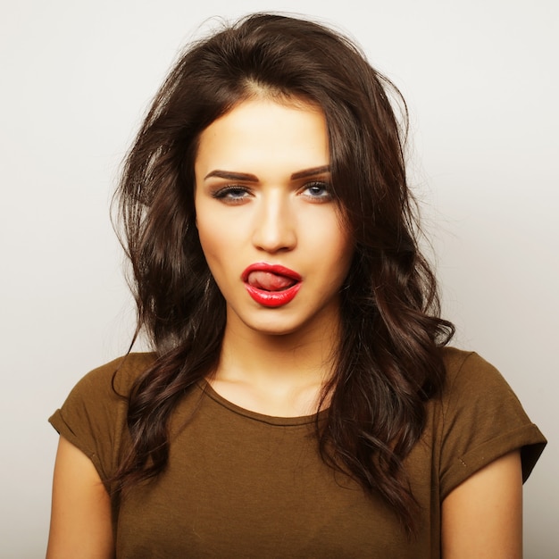 Portrait of a pretty girl  on a white background