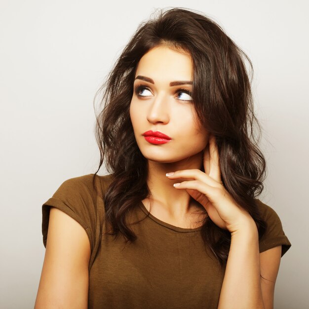 Portrait of a pretty girl  on a white background