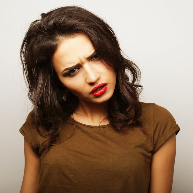 Portrait of a pretty girl  on a white background