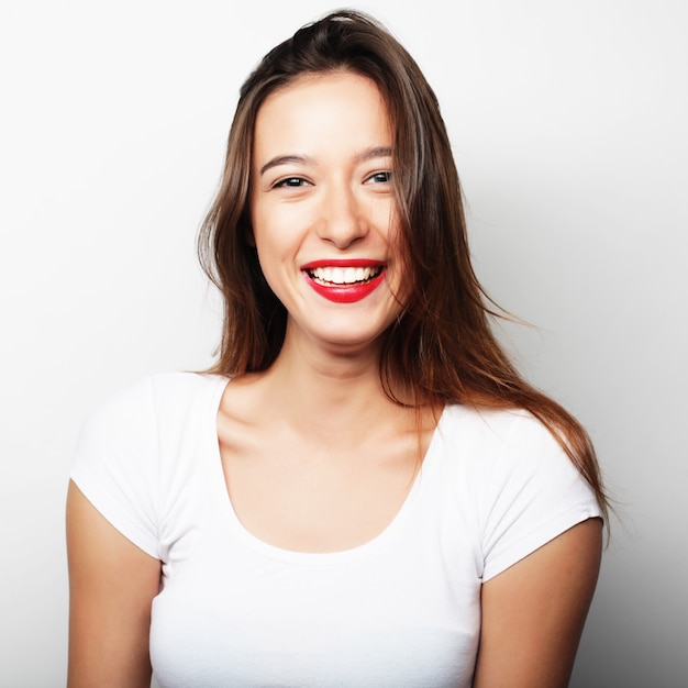 Portrait of a pretty girl  on a white background