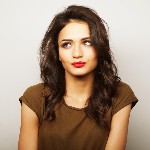 Portrait of a pretty girl on a white background