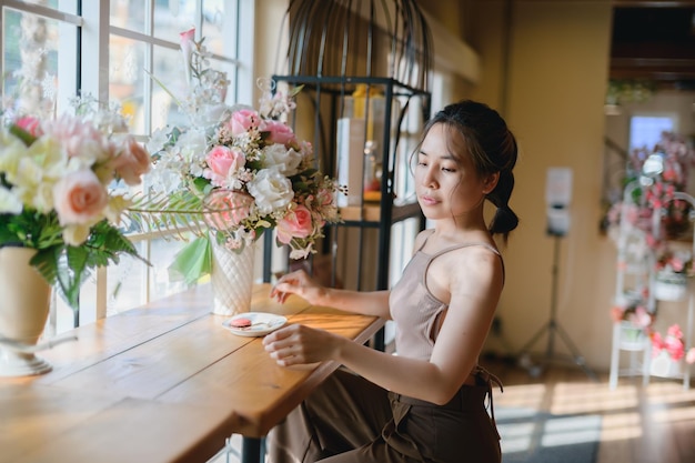 PORTRAIT Pretty woman in a restaurant cafe with feeling happy