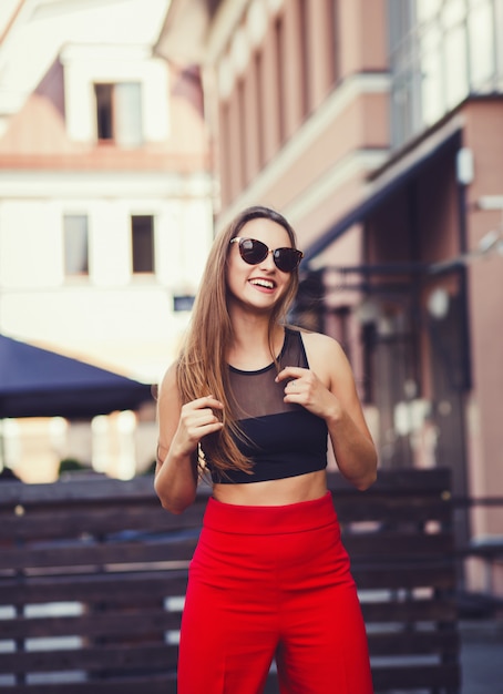 Portrait of pretty young girl in sunglasses