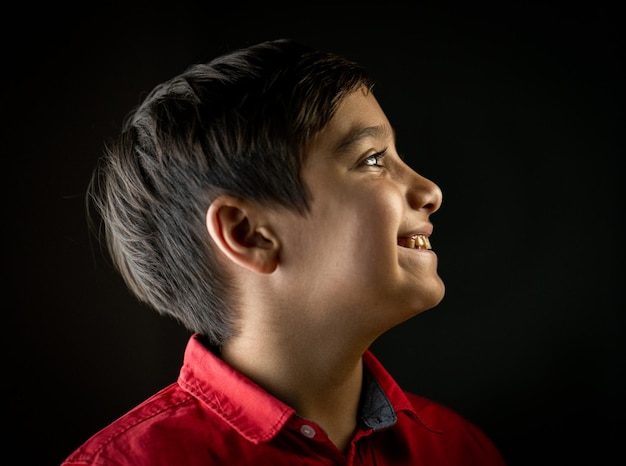 Portrait of real happy mixed race child smiling. High quality photo