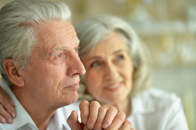 Portrait of sad senior couple