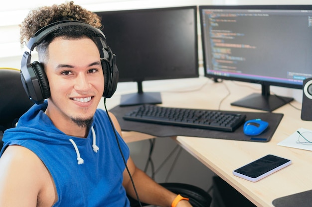 Portrait of a selfemployed man working at home looking at the camera smiling